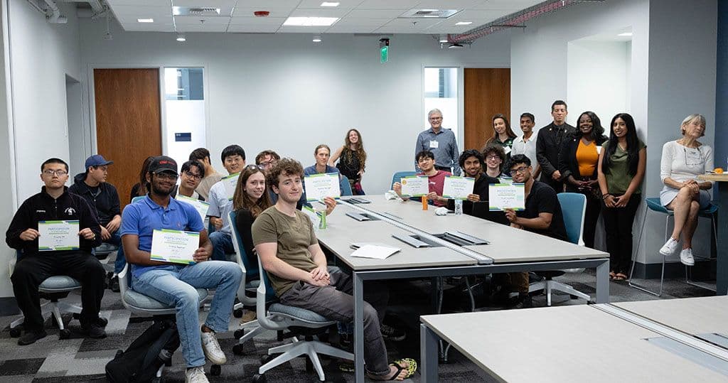 Students and judges at the conclusion of the hackathon